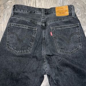 Black washed out Levi’s dad jeans